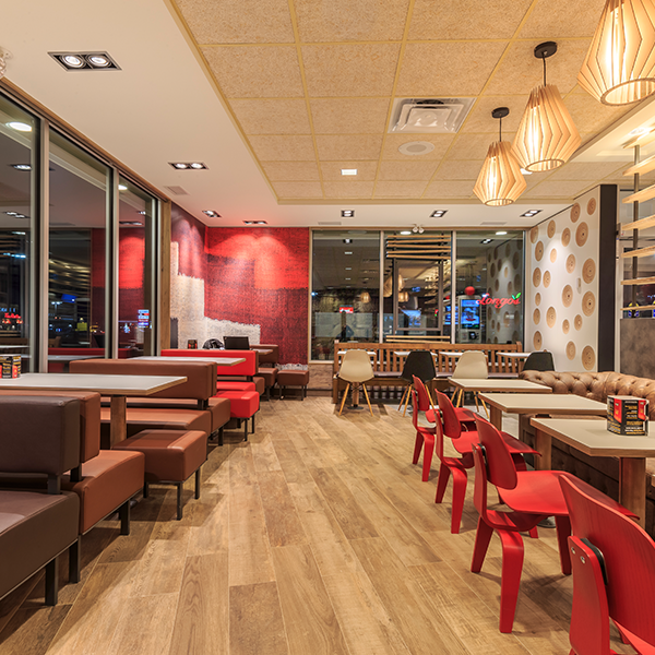 Restaurant Installation - Custom Hospitality Furniture McDonald's Wood & Stone Restaurant Installation - Custom Dining Furniture