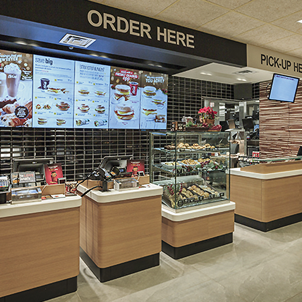 Restaurant Installation - Custom Hospitality Furniture McDonald's Wood & Stone Restaurant Installation - Custom Hospitality Furniture