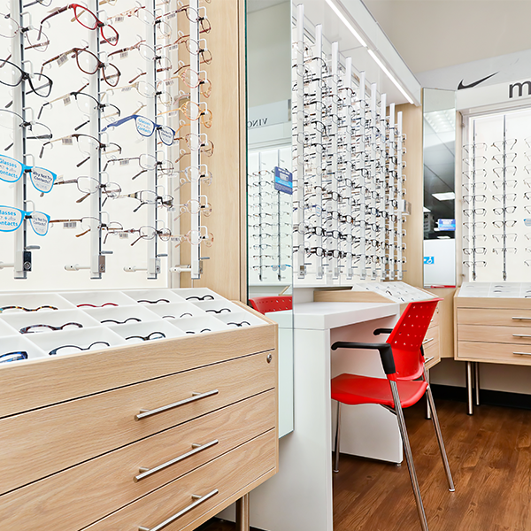 CVS Store Design - Custom Optical Display - Wall Glasses Display with built in Desk and Storage