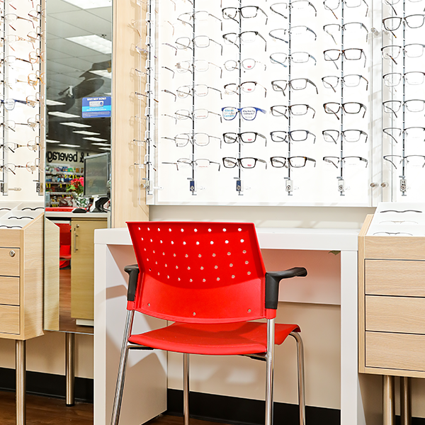 Custom Optical Displays CVS Store Design - Custom Optical Display - Wall Glasses Display with Built-in Mirrors and Desk