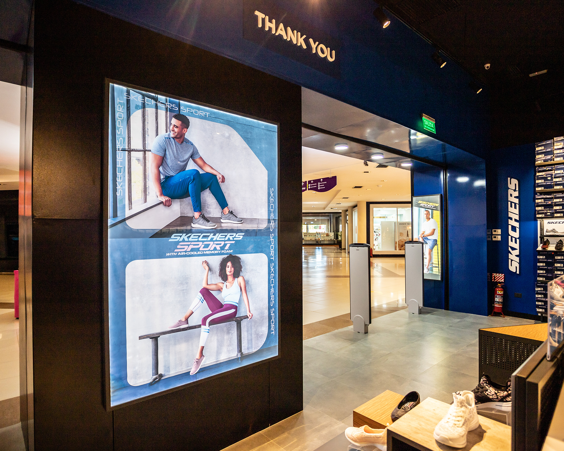 Custom Retail Furniture Skechers Store Design - Backlit Store Display